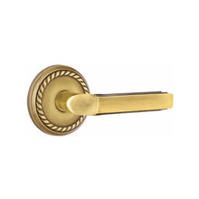 Load image into Gallery viewer, MILANO (M) PASSAGE (HALL/CLOSET) LEVER WITH 2-3/8" BACKSET AND 1/4" ROUND FACEPLATE AND STRIKEPLATE